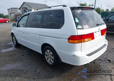 2002 Honda Odyssey Ex z USA, uszkodzony, nr VIN 2HKRL186X2H513923